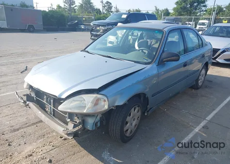 1999 Honda Civic Lx z USA, uszkodzony, nr VIN 2HGEJ6670XH566953